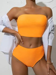 Olivia Mark - Elegant High-Waisted Bikini Set with Bandeau Top in Plain Fabric Solid Color Bandeau Tankini For Swimming, Strapless Solid Color Tankini For Beach Season, Beachwear Tube Top For Beach Season, Orange Strapless Tube Top For Beach, Strapless Orange Tube Top For Beach, Orange Strapless Swimwear For Swimming, Orange Strapless Swimwear For Pool, Stretch Solid Color Tube Top For Beach Season, Fitted Orange Tube Top For Beach