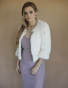 This Rabbit Fur jacket with Swarovski crystal clasp is a lavish accessory for those looking to dress up an outfit. Inspired by a design from the 1960s, this lightweight jacket's clean lines are the perfect garment to dress up any outfit. Clean box collar with straight front design Sits softly agains the body & incredibly soft to touch Hook/eye closure all the way down the front Perfect for the bride or anyone in the bridal party Made from ethically sourced 100% Rabbit Fur Hand Knit Lightweight N Rabbit Fur Jacket, Outfit Inspired, The 1960s, Rabbit Fur, Hook Eye, Versailles, Front Design, Fur Jacket, Lightweight Jacket