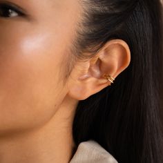 Our Claw Hoop Ear Cuff is a graceful, yet edgy interpretation of a classic ear cuff. This dainty and minimalistic piece can be worn alone or stacked with other earrings for additional style. Material: High Quality Solid 925 Sterling Silver Finish: Sterling Silver ∙ 18K Gold Featuring 9.5mm Inner and 12.5mm Outer Cuff Earrings Sold as a pair SKU: RR-ER274 Minimalist Tarnish Resistant Ear Climbers, Minimalist Tarnish-resistant Ear Climbers, Adjustable Minimalist Hoop Ear Cuff, Minimalist Pierced Adjustable Ear Cuff, Minimalist Adjustable Pierced Ear Cuff, Adjustable Minimalist Huggie Wrap Earrings, Minimalist Adjustable Huggie Wrap Earrings, Adjustable Tarnish Resistant Ear Cuff For Everyday, Minimalist Adjustable Piercings