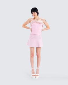 Embrace your flirty side in this pink mini skirt 💕 Made from stretch jersey and complete with a foldover waistband, a picot lace trim on the hem, and an invisible side seam zipper, this mini is the perfect sweet and sassy staple 😌 Pink Mini Skirt, Pink Mini, Cargo Pant, Shoe Collection, Best Sellers, Lace Trim, Print Dress, Jumpsuit Dress, Jumpsuit Romper