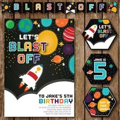 an outer space birthday party with rocket ship, stars and planets on the back ground