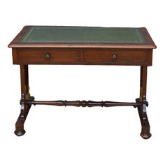 a wooden table with two drawers on one side and a leather top on the other