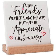 a sign that says it's the friends we meet along the way that helps appreciate the journey