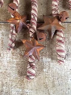 some brown and white candy canes with stars on them