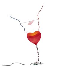 a red heart shaped balloon attached to a string