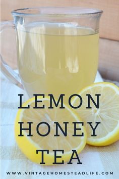 lemon honey tea in a glass mug with sliced lemons on the side and text overlay that reads, lemon honey tea