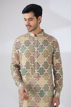 Green bandhani kurta highlighted with sequin embroidery. Paired with a cotton silk pant. - Aza Fashions Cotton Bandhgala With Printed Motifs For Festive Occasions, Block Print Kurta For Wedding And Festivals, Wedding Kurta With Block Print For Festivals, Designer Sherwani With Printed Motifs For Festive Occasions, Bollywood Style Sherwani With Printed Motifs, Bollywood Style Festive Bandhgala With Printed Motifs, Bollywood Style Kurta With Motifs For Diwali, Bollywood Style Cotton Traditional Wear With Resham Embroidery, Festive Cotton Sherwani With Traditional Fit