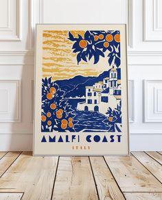 an orange tree with the words amalfi coast in blue and yellow on it