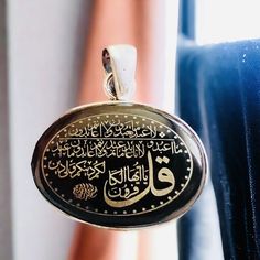 This beautiful 925 silver pendant features a unique Yemeni agate with the Kafurun Sureh Islamic For protection and wish engraving. The pendant has a religious theme and is designed in a stylish and elegant way, making it perfect for any occasion. The Sterling brand ensures a high-quality product, and the metal used is silver. This necklace is a great addition to any jewelry Islamic Necklace,Islamic Jewellery,Islamic Gift for Her,Muslim Gift for Him,Muslim Jewelry,Quran Written,Islamic Amulet,Isl Silver Hallmarked Jewelry For Blessing, Hallmarked Silver Jewelry For Blessing, Traditional Handmade Jewelry For Personalized Gift, Handmade Traditional Jewelry For Personalized Gift, Islamic Necklace, Arabic Jewelry, Islamic Jewelry, Islamic Gifts, Red Agate