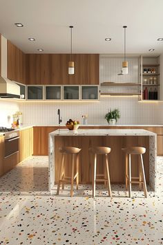 a kitchen with two stools and an island in the middle, surrounded by wooden cabinets