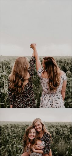 two women standing next to each other with their arms around each other in front of a field