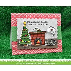 a handmade christmas card with a dog sleeping in front of a fireplace and a tree