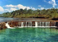 there is a large waterfall in the water