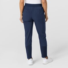 Designed for unparalleled comfort and mobility, our Wink Women's Flex-n-Reach Track Scrub pants will become your new workwear essential. Crafted with a luxurious four-way stretch fabric, they feel as cozy as your cherished yoga leggings. The jogger-style cut, with knit inserts at the calf, allows you to move freely, ensuring every task is a breeze.Say goodbye to restrictive work attire, thanks to our innovative Flex-n-Reach panels strategically placed to provide extra stretch where you need it m Fitted Bottoms With Functional Pockets For Work, Comfort Stretch Workwear Bottoms With Pockets, Comfort Stretch Bottoms With Pockets For Work, Stretch Utility Bottoms For Workwear, Versatile Comfort Stretch Pants With Side Pockets, Utility Style Stretch Bottoms For Work, Versatile Workwear Bottoms With Comfort Waistband, Fitted Pants With Functional Pockets For Work, Fitted Work Pants With Functional Pockets