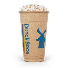 a cup of coffee with whipped cream on top and the words dutch bros written in blue