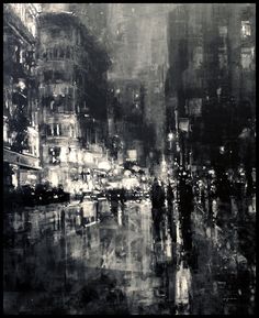 black and white photograph of people walking in the rain on a city street at night