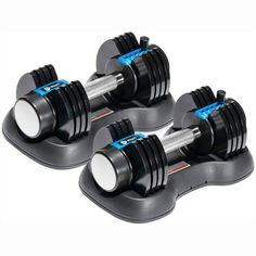 two black dumbbells sitting on top of each other