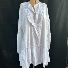 White Cotton Oversized Blouse. Super Cute Cut. Size Is Xl. Never Worn Oversized Blouse For Fall Vacation, Oversized Vacation Shirt For Spring, Oversized Shirt For Spring Vacation, Oversized Blouse For Vacation In Fall, Oversized Shirt For Fall Vacation, Oversized White Casual Blouse, Oversized Long Sleeve Blouse For Brunch, White Tunic Shirt For Spring, White Oversized Blouse For Beach