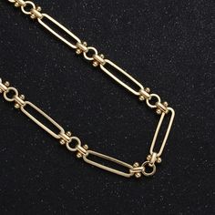 Item Details Material: Copper Based with 14K Gold Filled Chain Style : Roun Disc with moving balls and diamond cut connector Length : By Yard (3Feet) or at Your Choice Thickness: 3mm on Chain, Large Disc 21.9mmx 5.5mm (closed-soldered), Ball 2.9mm, rond circle 6 .1mm (closed-soldered). connector 6.5mm (open-unsodered) Please avoid chemical solutions, perfumes, excessive sweat, ocean water and pool water. Salt water and chlorine can damage your jewelry. Chlorine can damage and discolor metals tha Gold Satellite Chain Link Necklace, Gold Link Jewelry With Satellite Chain, Metal Ball Chain Link Necklaces, Gold Metal Ball Chain Necklace, Gold Metal Satellite Chain Necklace, Charm Holder, Gold Chains For Men, Small Charms, Gold Chain Jewelry