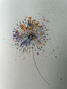 a watercolor painting of a dandelion with lots of color splatters