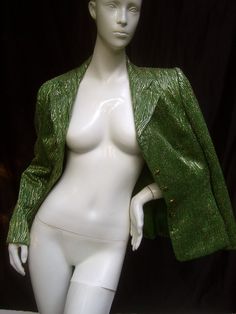 "Neiman Marcus Italian chartreuse metallic lame jacket The luxurious jacket is deigned with luminous textured fabric with a lime green background combined with streaks of gold metallic sinuous stripes Adorned with a set of green & gilt enamel buttons that run down the front Makes a very stylish formal wear garment perfect for weddings, holidays or any special formal occasion The chic Italian jacket is designed by Mirella Cavorso Roma Italy for Neiman Marcus No size label Refer to measurement Green Fitted Evening Blazer, Fitted Green Evening Blazer, Fitted Green Blazer For Evening, Elegant Green Silk Outerwear, Elegant Green Outerwear For Evening, Green Evening Blazer For Fall, Metallic Fitted Evening Outerwear, Spring Metallic Fitted Blazer, Metallic Fitted Blazer For Spring