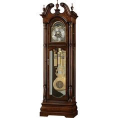 an antique grandfather clock with pendulums on the front and sides, isolated against a white background