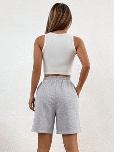 SHEIN EZwear Solid Knot Waist Slant Pocket Shorts | SHEIN USA Casual Short Crop Top For Loungewear, Casual Short-length Crop Top For Loungewear, Casual Short Length Crop Top For Loungewear, Casual Sleeveless Crop Top With Built-in Shorts, Casual Short Crop Top For Beach, Summer Cotton Crop Top With Built-in Shorts, Casual Crop Top With Built-in Shorts, Casual White Short Crop Top, Casual Short Crop Top For Vacation