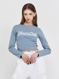 Editor's NotesIt's a cropped top with a retro mood of crack lettering. Minimal accentuation is added with round neckline and nickel snap.- Cropped length- Snap button- Great to style in many ways- Versatile and daily itemMeasurements(in.)One size- Total length: 16.53 in.- Shoulder: 12.99 in.- Chest: 14.96 in.- Sleeve length: 23.62 in.*Model Info- Iva: Height 5'61 Composition & Care- 95%Cotton, 5%Span- Dry cleaning- Hand washable- No bleachingDesignerby ODD STUDIO Blue Cropped T-shirt With Letter Print, Blue Letter Print Crop Top For Streetwear, Trendy Blue Cropped T-shirt With Letter Print, Blue Letter Print Cropped T-shirt For Spring, Blue Graphic Tee Crop Top With Letter Print, Spring Blue Cropped T-shirt With Letter Print, Blue Cropped T-shirt With Letter Print For Spring, Club Snap, Youth Club