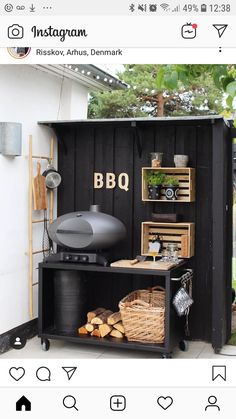 an outdoor bbq with grill and barbecue basket