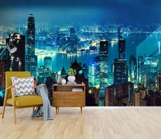 a living room with a city skyline wall mural