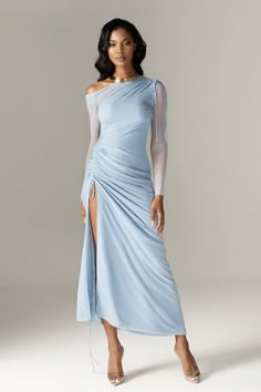 Its from our lightweight organza mesh fabric, blended with the purest, most luxurious mulberry silk in a pretty pastel blue hue. 'Dua’ is one of the highlights of our new season collection. Featuring an off shoulder neckline with pretty adjustable shoulder that create a beautiful shape around the neck and ruched effect gently down through the bust. The delicate gathering throughout flatters your figure and the sleeves fit slim through the arms. The close fit is enhanced by the special soft inner Pastel Dress Outfit Wedding, Icy Blue Dress, Ethereal Goddess, Pastel Blue Dress, Bridesmaids Proposal, Cut Out Maxi Dress, Glam Party, Duchess Satin, Purple Mini Dresses