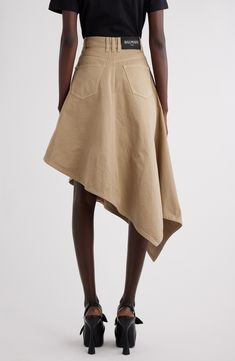 From Olivier Rousteing's collection of reminisces of his Bordeaux childhood, this runway-featured skirt combines a flared, asymmetric silhouette with the casual comfort of a favorite pair of kicking-around-in jeans. 22" to 38" length (size 38) Zip fly with button closure Five-pocket style Unlined 100% cotton Dry clean Made in Italy Designer Clothing Skirt Runway, Cotton Midi Skirt, Crochet Skirt, Handkerchief Hem, Mid Length Skirts, Pleated Midi Skirt, Cotton Skirt, Street Chic, Denim Women