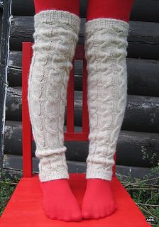 the legs of a woman wearing red and white socks