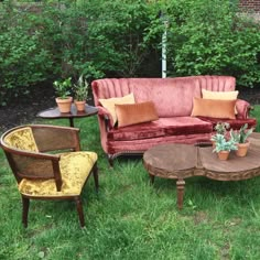 an assortment of furniture sitting in the grass