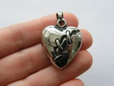 1 Heart pendant 31.5 x 26mm Stainless steel Silver Surgical Steel Heart Jewelry, Silver Heart-shaped Surgical Steel Jewelry, Antique Silver Nickel-free Heart Pendant, Antique Silver Heart Jewelry With Oxidized Finish, Antique Silver Heart-shaped Nickel-free Jewelry, Wolves Pendants, Doll Wardrobe, Funky Jewelry, Heart Charm