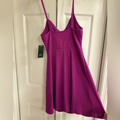 Cute Plum Purple Sleeveless Mini Dress With Ribbed Texture, Sweetheart V-Neckline And Soft Molded Cups. Made Of Stretchy Fabric. Stretch V-neck Lined Mini Dress, Stretch V-neck Mini Dress, Casual V-neck Dress With Built-in Bra, Fitted Purple Sleeveless V-neck Dress, Fitted V-neck Sleeveless Purple Dress, Purple V-neck Lined Dress, Purple Stretch Dress With Spaghetti Straps, Purple Stretch Spaghetti Strap Dresses, Stretch Purple Dresses With Spaghetti Straps