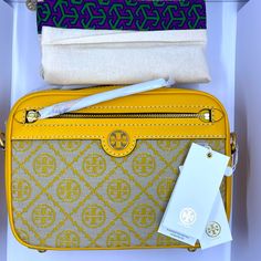 Bnib Tory Burch Crossbody Camera Bag In Goldfinch W/ Monogram Pattern W/Dust-Bag. Beautiful Classic Tory Burch Monogram Pattern With Goldfinch Crossbody Strap. 100% Authentic Tory Burch. Designer Tan Crossbody Bag, Designer Tan Crossbody Box Bag, Tan Coated Canvas Shoulder Bag, Designer Tan Box Bag With Detachable Strap, Tan Shoulder Bag For Travel, Yellow Rectangular Coated Canvas Bag, Designer Tan Satchel With Removable Pouch, Yellow Coated Canvas Shoulder Bag For Travel, Designer Tan Satchel For Travel