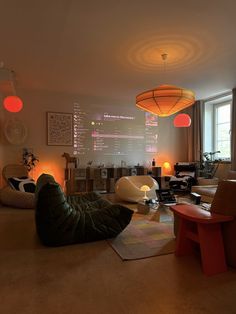 a living room filled with furniture and lights