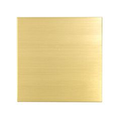 a gold metal plate on a white background