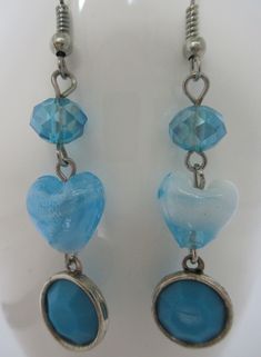 "Item Description:  Vintage Blue White Heart Lampwork Glass Earrings, Long Geometric Boho Drop, Bold Statement Glass Dangle Earrings Condition: Excellent Color(s): Blue and White Size: 2\" x 0.5\" (at widest points) Closure: Ear Wires Weight: 5.4 grams (for both earrings) Markings: None Inventory No: PER Bg 1 All earrings have been professionally cleaned and sterilized for your health and safety.  We are happy to combine shipping for multiple items. New items are added daily so please come back Blue Bohemian Heart Earrings For Gift, Blue Bohemian Heart Earrings As Gift, Bohemian Blue Heart Earrings For Gifts, Bohemian Blue Heart Earrings As Gift, Blue Heart Earrings For Party, Trendy Blue Glass Jewelry, Blue Handmade Heart Drop Earrings, Handmade Blue Heart Drop Earrings, Blue Heart-shaped Earrings For Party