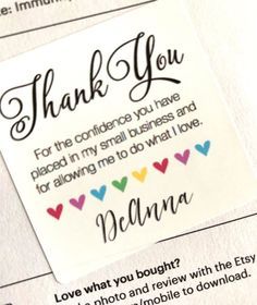 a thank card with hearts on it