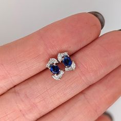 These beautiful stud earrings feature a pair of 0.54-carat weight blue sapphire gemstones with natural earth-mined diamonds, all set in solid 14K dual-tone gold. These pair of earrings can be a lovely September birthstone gift for your loved ones! These earrings are made with solid 14k Gold and natural earth-mined SI / G-H Diamonds. As listed, these earrings are ready to ship. If you're interested in purchasing this setting with a different center stone please message us! White Gold Sapphire Diamond Earrings, Fine Jewelry Sapphire Earrings In Diamond White, Sapphire Diamond Accented Earrings In Fine Jewelry, Fine Jewelry Sapphire Diamond Earrings, Sapphire Diamond Earrings With Gemstone Detail, Blue Sapphire Diamond Earrings As Gift, Sapphire Color Oval Diamond Earrings, Sapphire Diamond Earrings With Accents, Gift Blue Sapphire Diamond Earrings