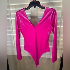 Really Cute Bodysuit With A Velvet Type Texture Size Xs Pink Fitted V-neck Bodysuit, Chic Fitted Pink Bodysuit, Fitted Pink Bodysuit For Party, Pink Fitted Bodysuit For Night Out, Fitted Pink V-neck Bodysuit, Pink V-neck Bodysuit For Party, Pink V-neck Party Bodysuit, Long Sleeve Body Suit, Gianni Bini