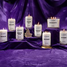 seven candles with the names of each candle are on a purple cloth, surrounded by an image of a horse