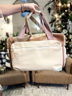 This spacious bag fits in most airplane overhead compartments and meets most airline carry-on restriction requirements! Our roomy bag can hold up to 25lbs! Our duffles are 100% PU leather and are fully lined with 100% polyester lining. Overall dimension 19" L x 11” W X 12" T Front pocket for storing personal items 17"L x 10 1/2"W x 2"D Internal Zipper Pocket 10"W x 8"T Large Capacity Beige Laptop Bag For Travel, Beige Luggage With Sleeve For Everyday Use, Beige Travel Bag With Luggage Sleeve, Beige Travel Bag With Luggage Sleeve For On-the-go, Beige Shoulder Bag With Luggage Sleeve For Overnight Trips, Beige Travel Bag With Large Capacity, Beige Large Capacity Travel Bag For Trips, Large Capacity Beige Travel Bag For Trips, Beige Shoulder Bag With Luggage Sleeve For Weekend Trips