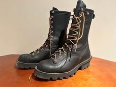 Up for sale is a pair of pristine Danner Flashpoint II boots; *Marked size-13EE, 10" shafts, Vibram fire logger *Style-duck hunting boots *Made in USA This is a pre-owned pair of boots in good superb condition and sold as is. Upper shell shows general cosmetic flaws associated with pre-owned boots. No foul odors, comes from a pet/smoke free home. Please see all pictures for a better visual description and do not hesitate to contact us via Etsy if you have any question(s). Thanks for looking. Black Steel Toe Work Boots For Outdoor, Black Hunting Boots With Reinforced Toe, Black Steel Toe Hunting Boots, Black Hunting Boots With Steel Toe, Firefighter Boots, Ghost Ship, Hunting Boots, Duck Hunting, Mens Black Leather