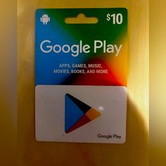 a google play card sitting on top of a table