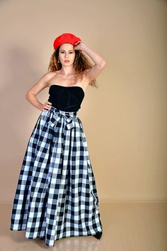 "This beautiful 80s black and white checkered skirt is made out of high quality soft cotton fabric. It is high waisted and has a separate 2,5m (8ft) long belt, made of the same fabric as the skirt and a hidden zipper on the side. You can tie the belt into a bowtie or however else you want. Pockets can be sewn in if you want to. Perfect for any day, that is special to you. Care: hand wash and hang dry Available Size: XS, S, M, L, XL, 2XL, 3XL, 4XL, 5XL, 6XL, 7XL, 8XL The model wears size M - 5,7' Plaid Cotton Long Skirt, Plaid Long Cotton Skirt, Long Plaid Cotton Skirt, Plaid Cotton Flared Skirt, Cotton Plaid Flared Skirt, Fitted Cotton Gingham Skirt, Gingham Cotton Skirt, Cotton Gingham Skirt, Retro Gingham Cotton Skirt