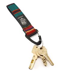 Crafted from artisan fabric and a carabiner of anodized lightweight aluminum, this keychain is built to withstand the rigors of daily use. Beyond its practicality, this keychain is also a stylish accessory. Available in an array of vibrant artisan fabrics, it adds a touch of personality to your outfit. Whether you prefer a sleek and minimalistic design or a bold and eye-catching statement piece, there's a Klip Keychain to suit every taste. Name: ‘Klip’ means 'Clip' in Indonesian, which is well suited to how easily this keychain can clip on to anything you want. Multicolor Keychain With Key Leash For Everyday Use, Multicolor Keychains With Key Clip For Everyday, Jungle Band, Casual Sling Bag, Fabric Keychain, Artisan Textiles, Small Travel Bag, Camera Backpack, Flap Backpack