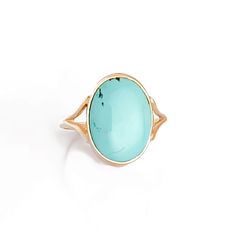 A one of a kind ring with a large, natural, turquoise cabochon from the Sleeping Beauty mine. The ring is made of solid 14k yellow gold. The simple ring design displays the natural beauty of the turquoise. Ring size 8. Dimensions: The turquoise is 16x12mm. The face of the ring is 17x13mm. The ring band tapers from 8mm at the shoulders to 1.25mm in the center back.  Handmade in the USA. Turquoise Opal Ring With Oval Cabochon, Turquoise Oval Cabochon Ring, Oval Turquoise Chrysoprase Ring, Turquoise Chrysoprase Ring, Elegant Turquoise Chrysoprase Rings, Simple Ring Design, The Sleeping Beauty, Robin Egg Blue, Simple Ring